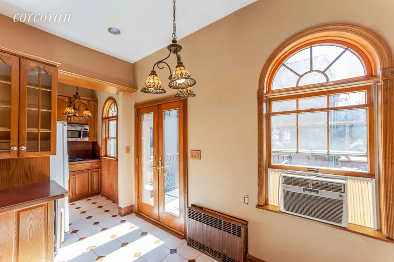 New York City Real Estate | View 289 Court Street | Kitchen with Exquisite Windows and Deck Access | View 10