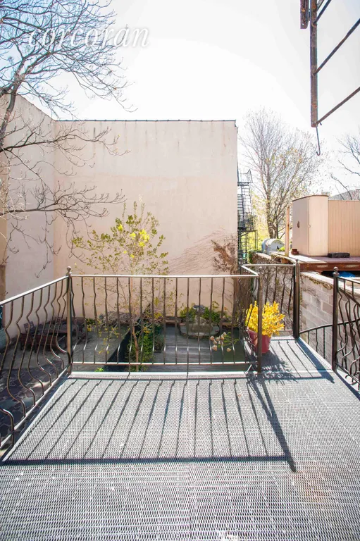 New York City Real Estate | View 289 Court Street | Spacious Deck Spiral Staircase to Courtyard | View 12