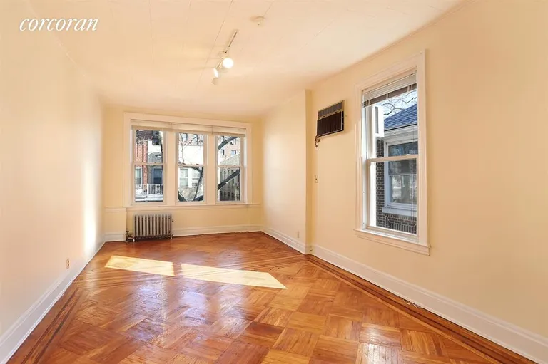 New York City Real Estate | View 29 Clara Street, 2 | Sun-Filled Living Room with 2 Exposures | View 2