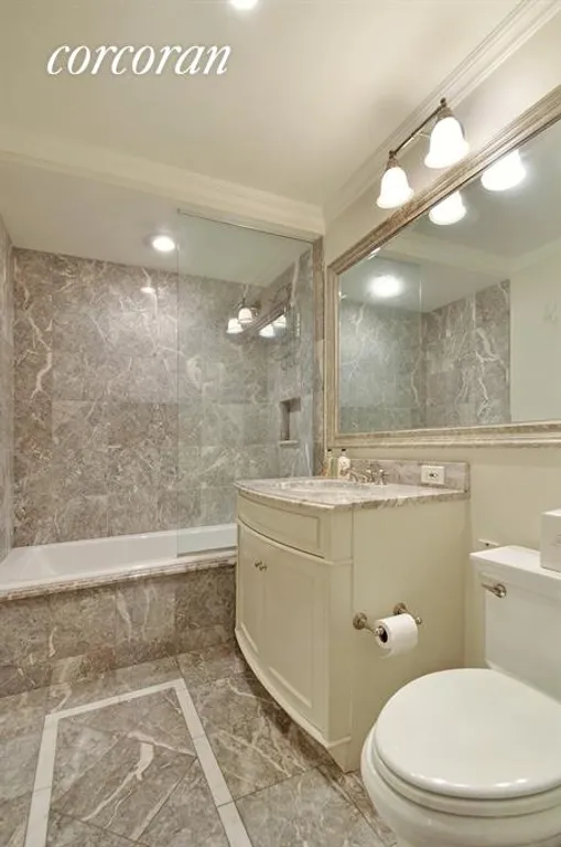 New York City Real Estate | View 502 Park Avenue, 11K | Luxurious Marble Bathroom | View 4