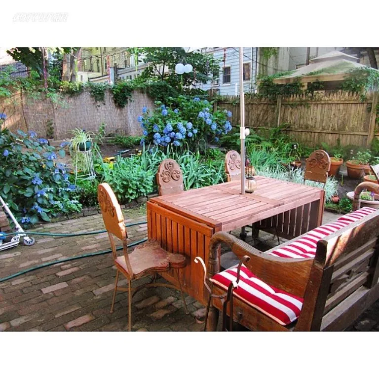New York City Real Estate | View 110 Clinton Avenue, 1C | Patio in the garden | View 8