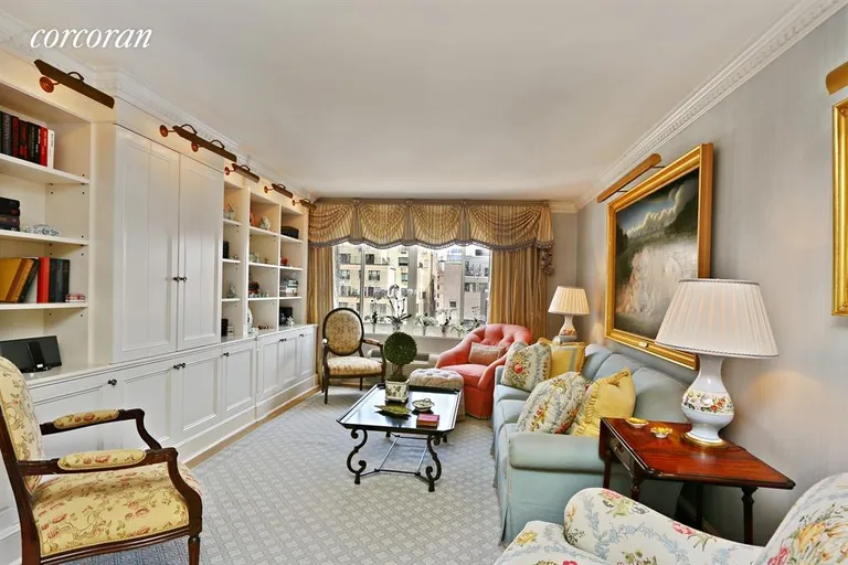 New York City Real Estate | View 115 East 87th Street, 12A | Living Room with custom cabinetry  | View 2