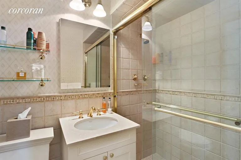 New York City Real Estate | View 115 East 87th Street, 12A | Master Bathroom w/stone tiles shower stall | View 11