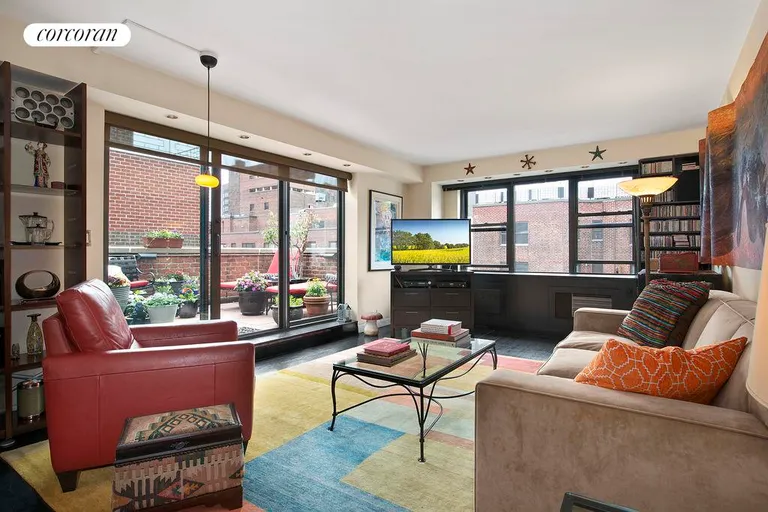 New York City Real Estate | View 405 East 63rd Street, 11E | Corner Living Room with South & Eastern Views | View 3