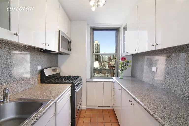 New York City Real Estate | View 301 East 79th Street, 10B | Windowed Kitchen with Open Northern Views  | View 2