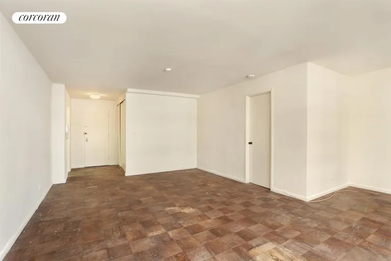 New York City Real Estate | View 225 East 57th Street, 8Q | Living Room / Dining Room | View 2