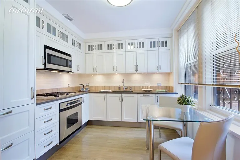 New York City Real Estate | View 27 West 72nd Street, G1 | Large windowed eat-in kitchen  | View 2