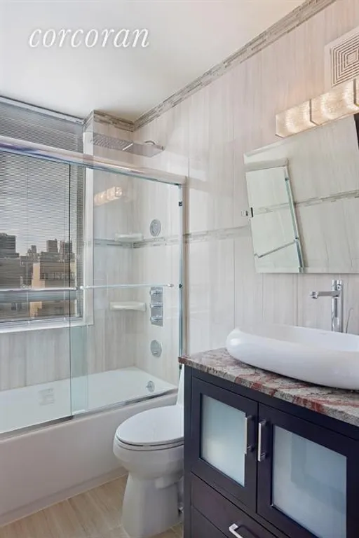 New York City Real Estate | View 171 East 84th Street, 18G | Master Bathroom | View 4