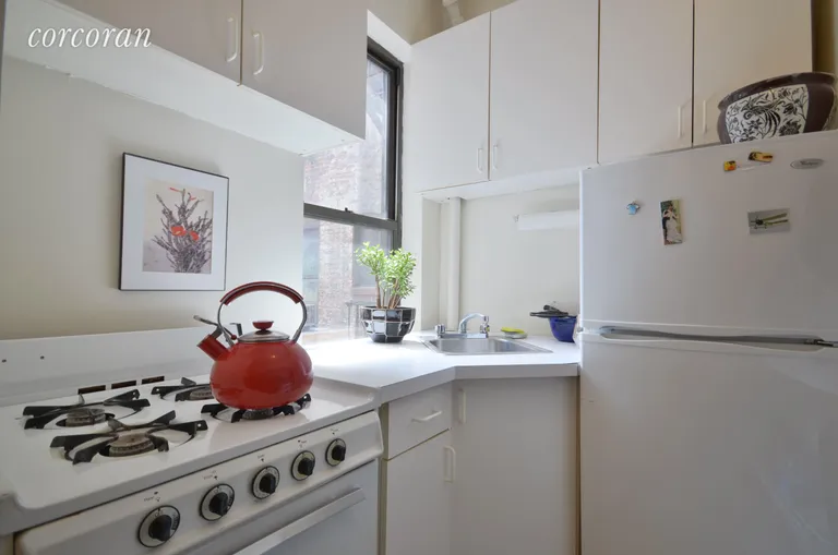 New York City Real Estate | View 206 Thompson Street, 8 | Sunny kitchen with plenty of cabinet space.  | View 2