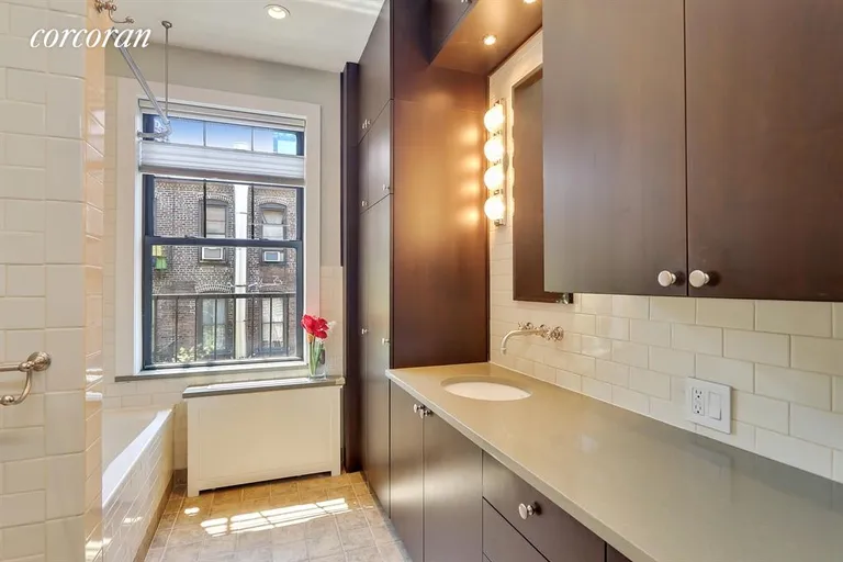 New York City Real Estate | View 434 West 47th Street, 4E | Large bathroom with two windows | View 5