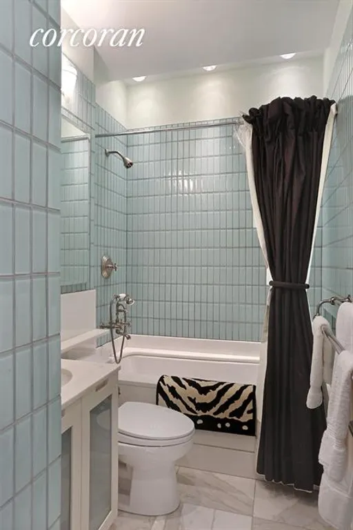 New York City Real Estate | View 200 East 65th Street, 26N | Stunning Glass Tiled Bathroom | View 8