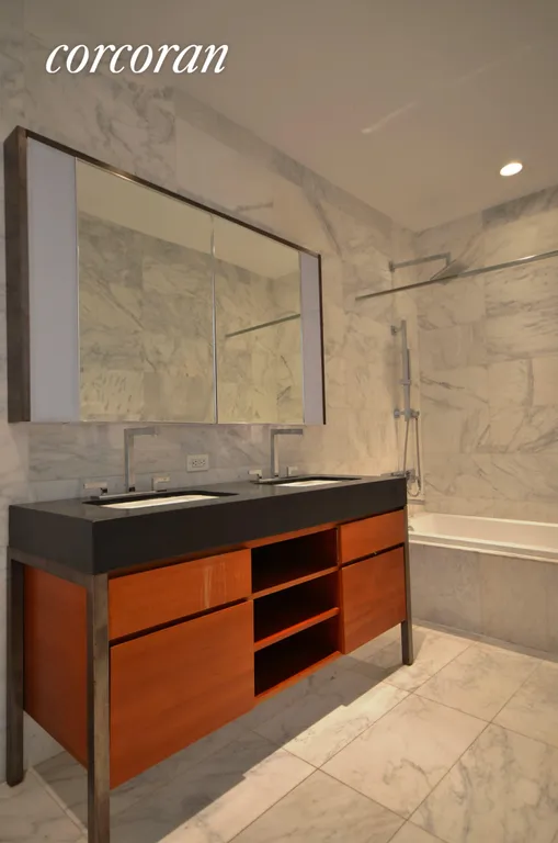 New York City Real Estate | View 75 Wall Street, 18N | Dual Sinks and surrounded in marble!  | View 3