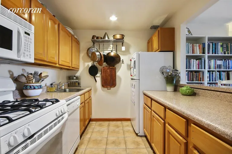New York City Real Estate | View 253 West 73rd Street, 12H | Pass-through kitchen | View 2