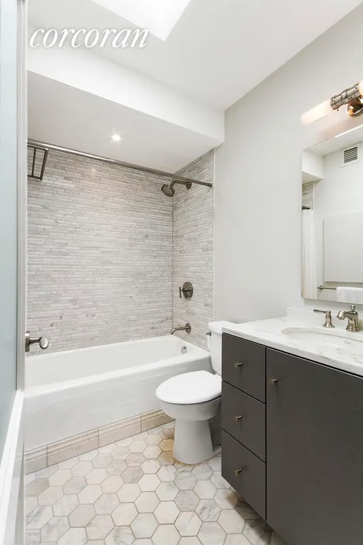 New York City Real Estate | View 167 Perry Street, 6D | Spa-like bath | View 5