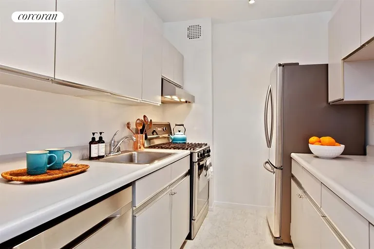 New York City Real Estate | View 11 West 104th Street, 2B | Oversized kitchen with stainless steel appliances | View 3