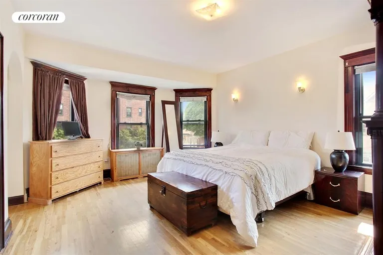 New York City Real Estate | View 596 East 26th Street | Master bedroom with 2 exposures + decorative fp | View 5