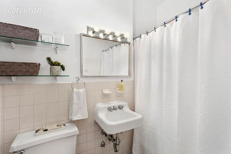 New York City Real Estate | View 85 Livingston Street, 18M | Pristine Bathroom | View 2