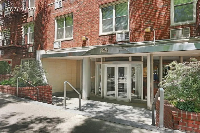 New York City Real Estate | View 309 East 87th Street, 3MN | Landscaped building entrance, 24-hour doorman | View 10