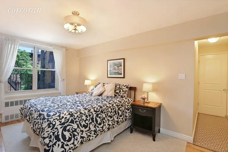 New York City Real Estate | View 309 East 87th Street, 3MN | Serene master bedroom looks over gardens | View 5