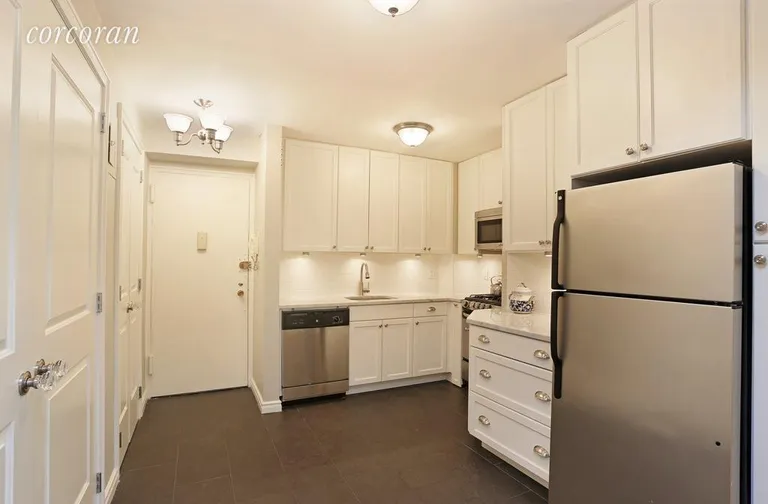 New York City Real Estate | View 309 East 87th Street, 3MN | Storage galore in this well designed kitchen | View 4