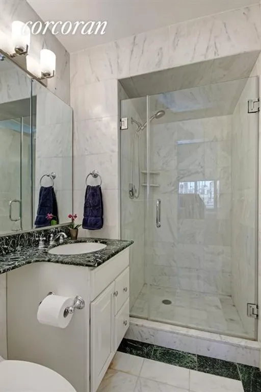 New York City Real Estate | View 111 East 85th Street, 9G | Master Bathroom | View 6