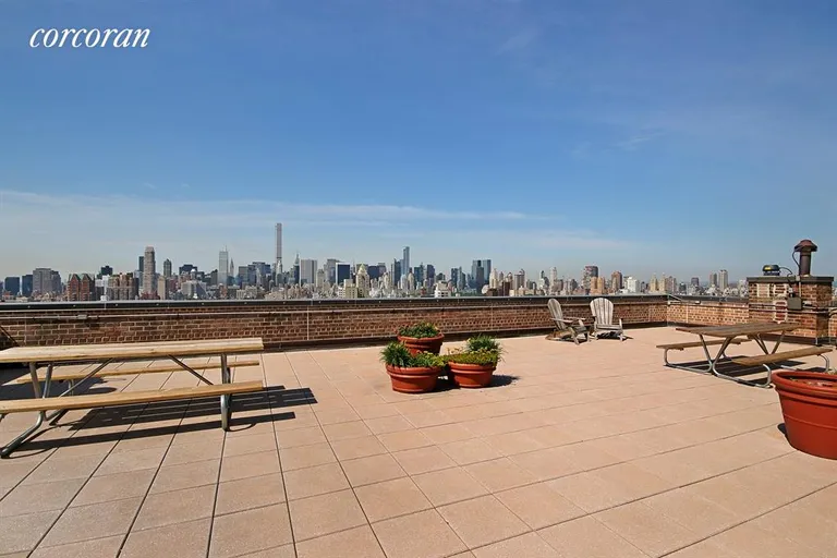 New York City Real Estate | View 111 East 85th Street, 9G | Common Roof Deck | View 9