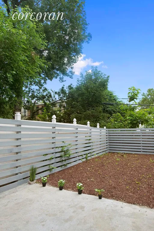 New York City Real Estate | View 748 Madison Street | Garden with New Patio and New Fence | View 6