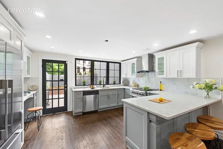 New York City Real Estate | View 748 Madison Street | Brand new kitchen leads out to the garden | View 3