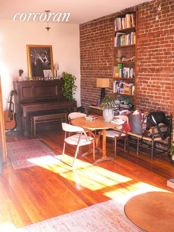 New York City Real Estate | View 495 Pacific Street, 2 | Dining area with exposed brick walls | View 4