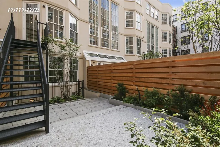 New York City Real Estate | View 349A State Street | Rear garden in two-family layout. Stairs up to pri | View 19