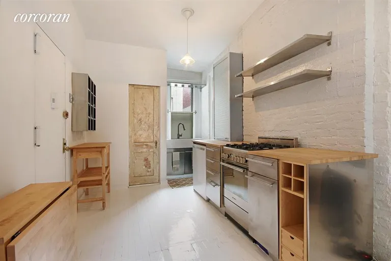 New York City Real Estate | View 634 East 14th Street, 19 | Open Kitchen with stainless steel appliances | View 4