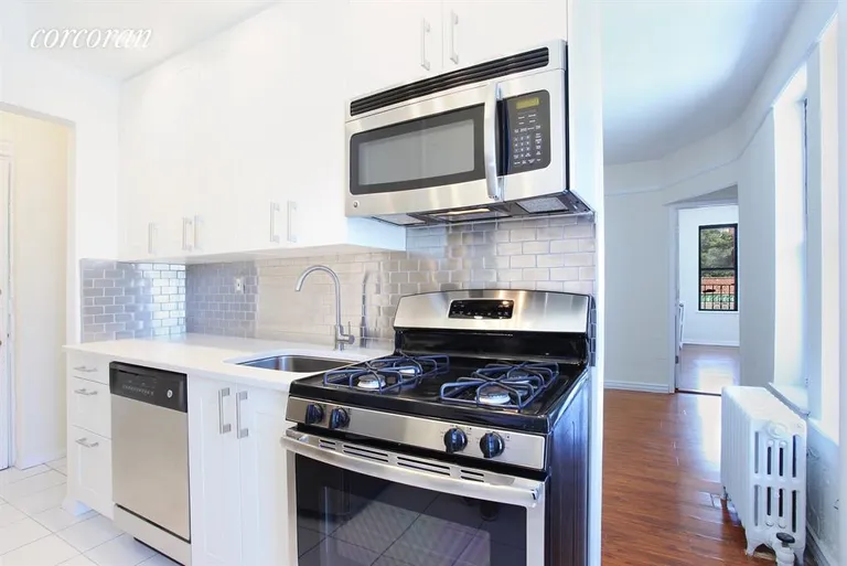 New York City Real Estate | View 235 East 2nd Street, C5 | Gleaming new renovated  eat-in kitchen with window | View 2