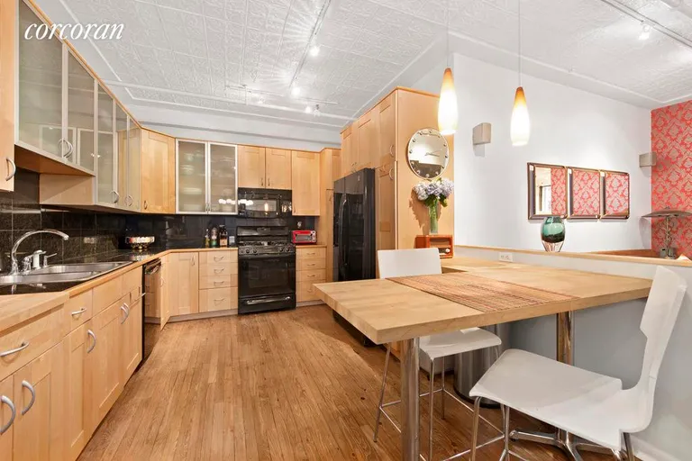 New York City Real Estate | View 131 West 28th Street, 4D | Bright and modern kitchen, great for any chef! | View 2
