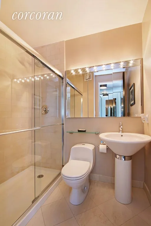 New York City Real Estate | View 233 East 86th Street, 19A | Two renovated marble baths with Porcher fixtures! | View 7