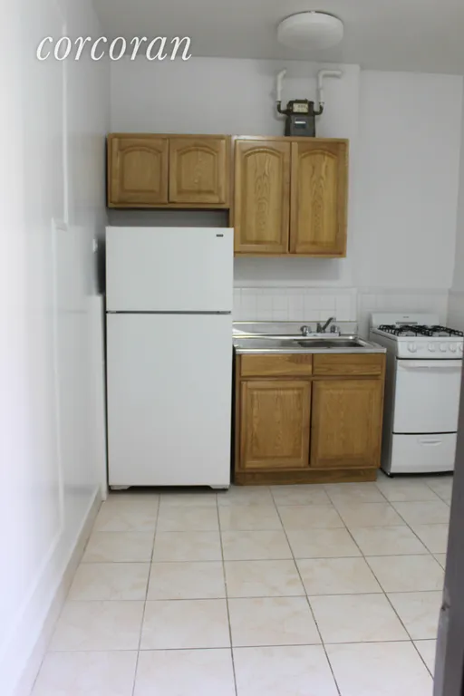 New York City Real Estate | View 95 Cabrini Boulevard, 2F | Eat-in Kitchen | View 3