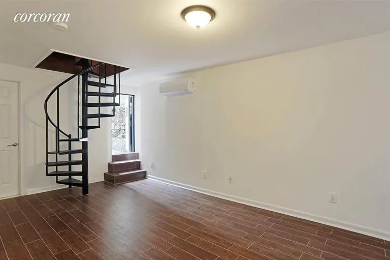 New York City Real Estate | View 86 16th Street, 1 | Lower Bedroom w/Private Outdoor Space & Full Bath | View 5