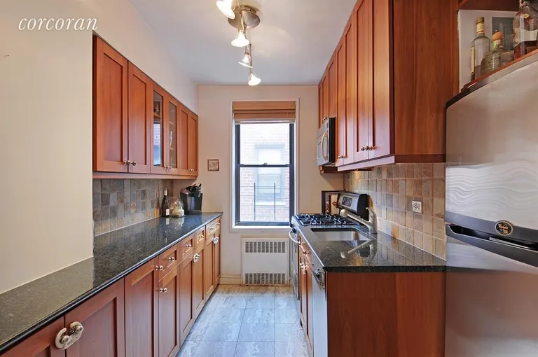 New York City Real Estate | View 30 East 9th Street, 6M | Windowed renovated kitchen! | View 2