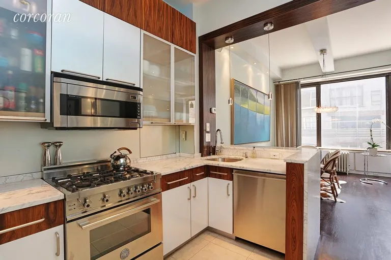 New York City Real Estate | View 21 East 22Nd Street, 4F | Top of the Line Open Kitchen With Bar | View 2