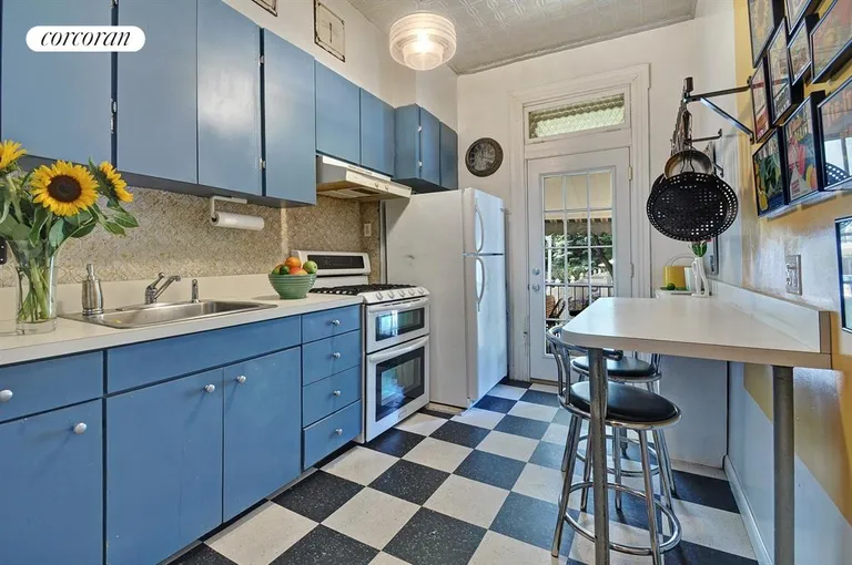 New York City Real Estate | View 526 74th Street | Retro-Inspired Kitchen with Original Tin Ceilings  | View 6
