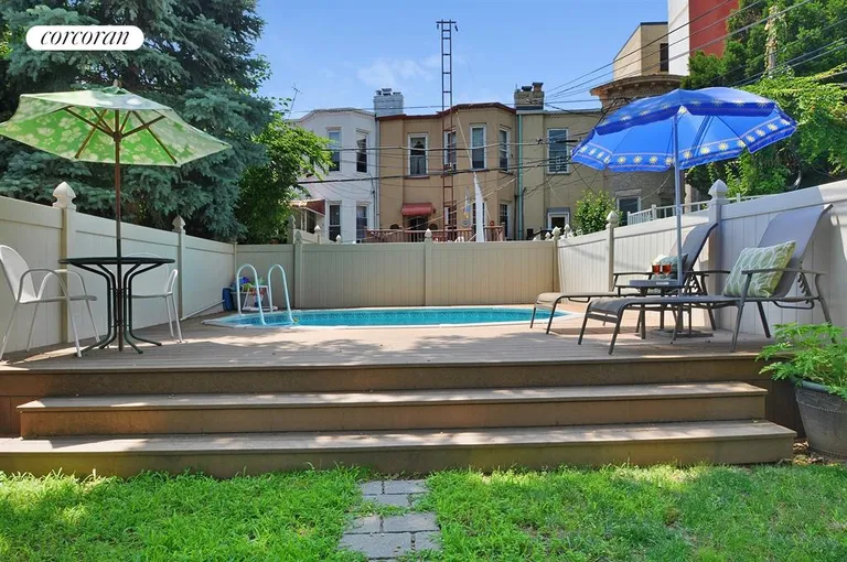 New York City Real Estate | View 526 74th Street | Fantastic Semi In-Ground Pool with Customized Deck | View 12