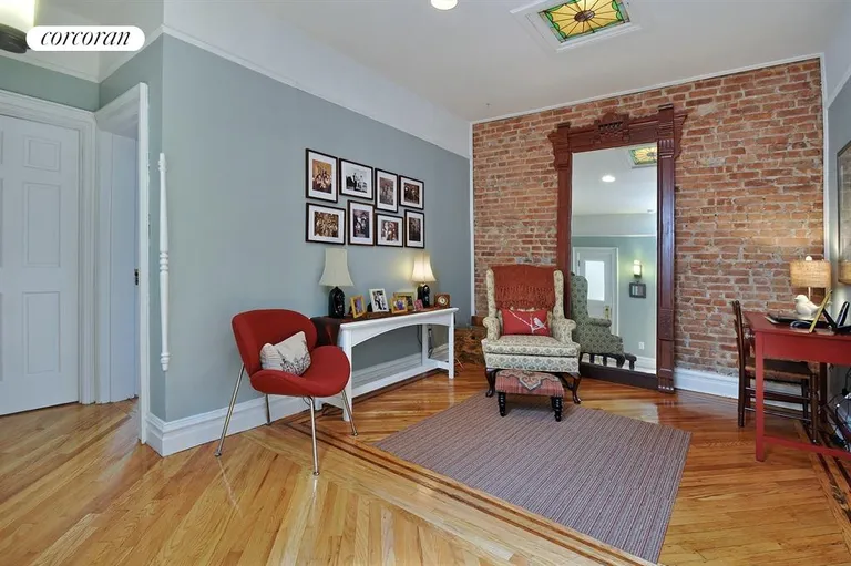 New York City Real Estate | View 526 74th Street | Den Area with Exposed Brick | View 10