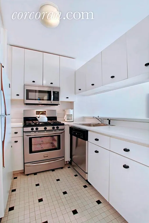 New York City Real Estate | View 45 East 25th Street, 12A | Bright pass-through kitchen | View 2