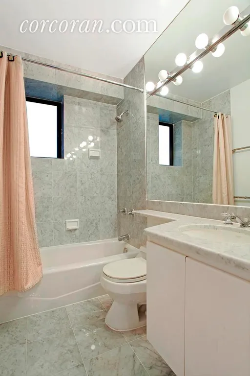 New York City Real Estate | View 45 East 25th Street, 12A | White marble windowed bath | View 3