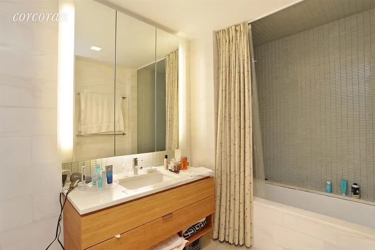 New York City Real Estate | View 303 East 33rd Street, 6L | very large bathroom with plenty of storage space | View 4