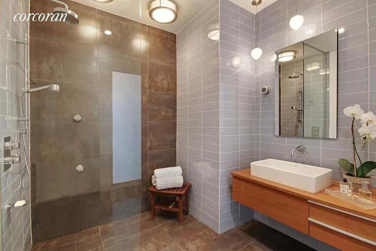 New York City Real Estate | View 420 West 25th Street, 2G | En suite master bathroom | View 5