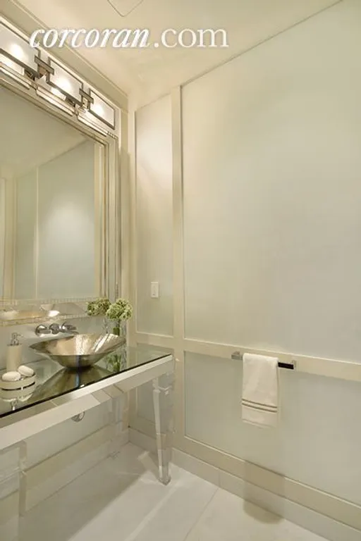 New York City Real Estate | View 20 West 53rd Street, 36A | Powder Room with frosted, mirror glass-panels  | View 7