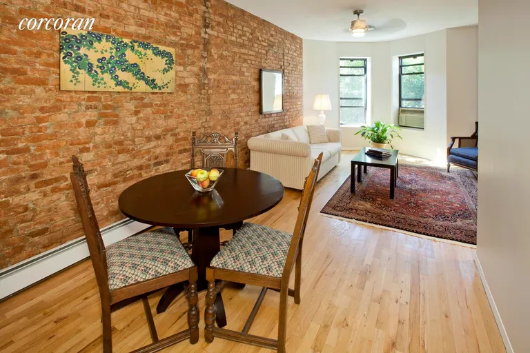 New York City Real Estate | View 15A Berkeley Place, 3B | Separate dining area with exposed brick  | View 3