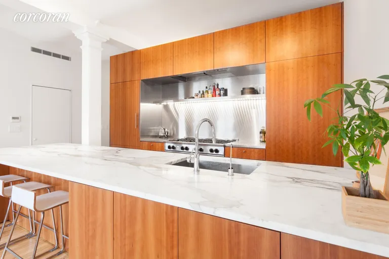 New York City Real Estate | View 45 Lispenard Street, 7W | Kitchen with 14x4' Marble Counter & Walk-in Pantry | View 3