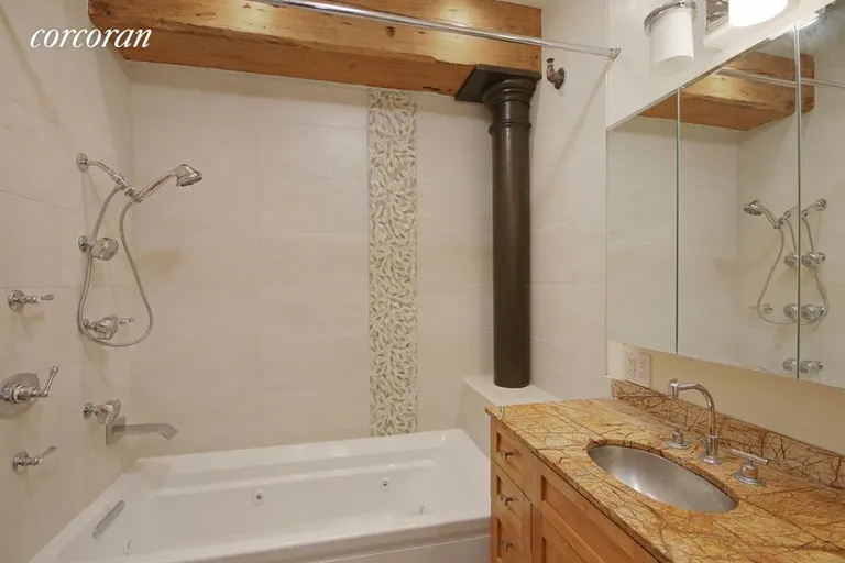 New York City Real Estate | View 108 Wooster Street, 4C | inviting master bathroom, | View 5