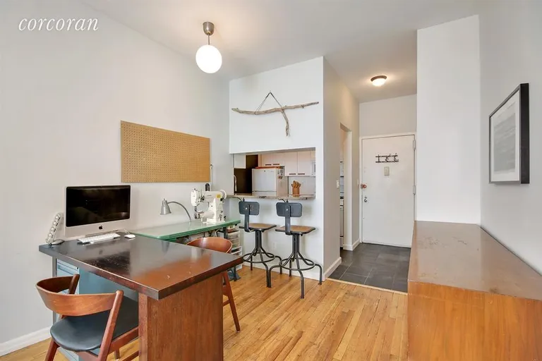 New York City Real Estate | View 350 West 14th Street, 3A | Pass through kitchen with breakfast bar! | View 2